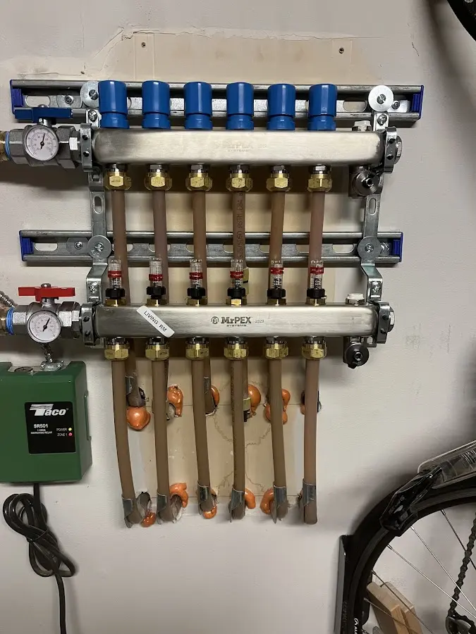 Plumber performing Sink Repair at a residential property in Johnston